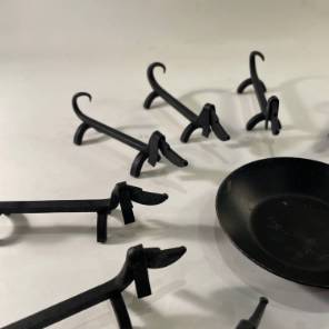 A Set of 12 French Knife Rests